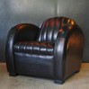 "ROADSTER" black leather club armchair model STREAMLINE