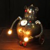 Petit robot lumineux en métal